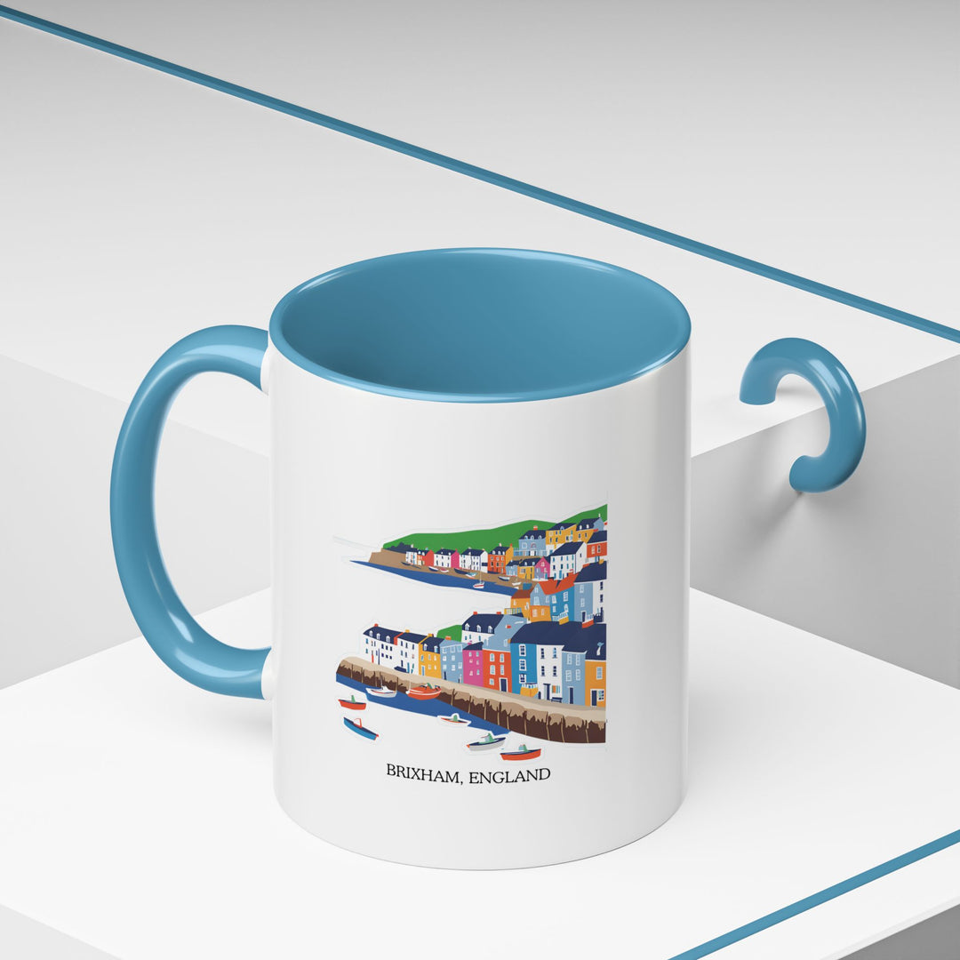 The Brixham England mug is perfect for showcasing the beauty of the town’s coastal vistas. Featuring stunning artwork of Brixham’s harbor, this mug is ideal for enjoying tea or coffee. Durable, dishwasher safe, and microwave safe for easy use.