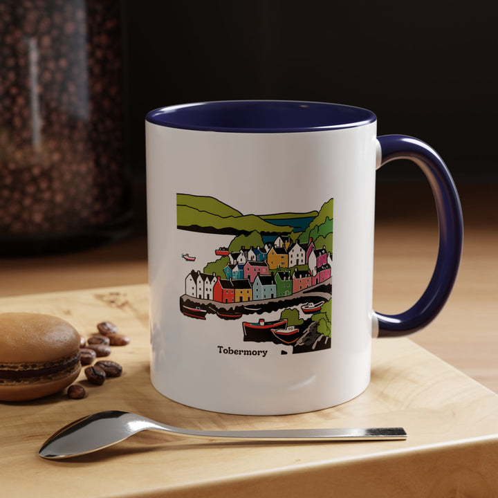 A beautifully designed Tobermory mug capturing the charm of the coastal town. Perfect for coffee or tea lovers, it features vibrant artwork inspired by the colorful harbor and landscapes of Tobermory. Durable and dishwasher safe, this mug is a meaningful gift for travelers and art enthusiasts.