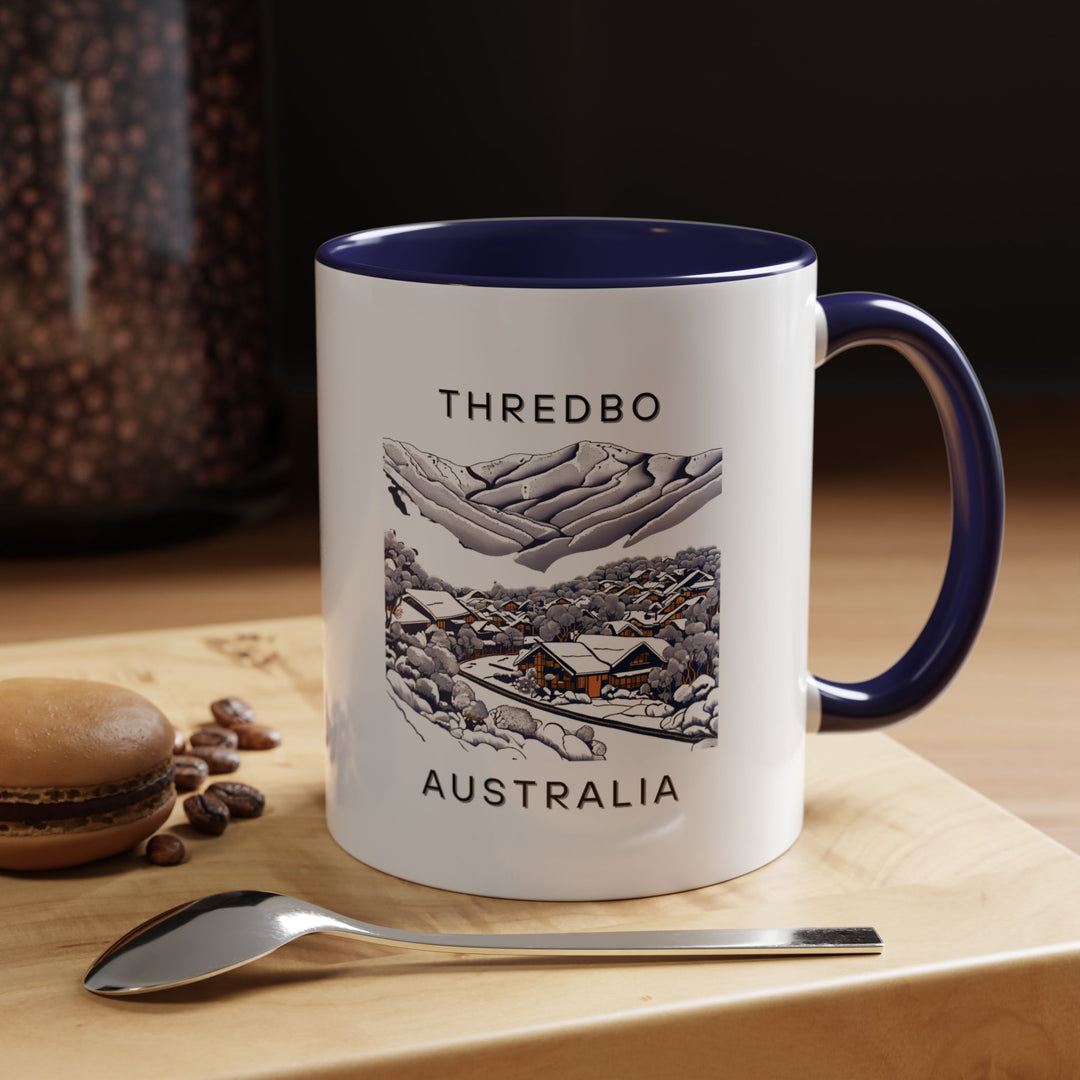 Thredbo Australia mug featuring a stunning print of the Australian Alps. The perfect gift for winter sports lovers, it combines practical functionality with artistic design. Dishwasher and microwave safe, ideal for everyday use or as a gift.