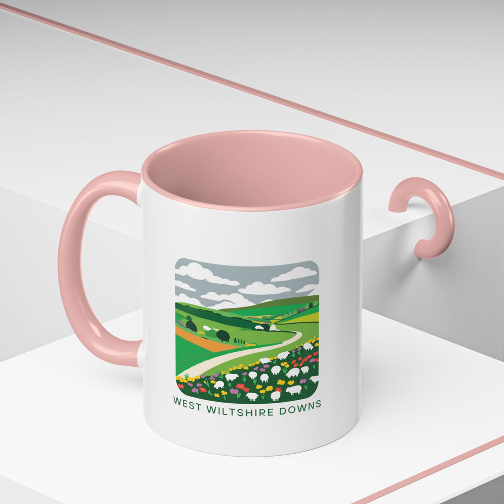 Experience the serenity of the West Wiltshire Downs with this elegant mug featuring detailed illustrations of rolling hills. Made from high-quality ceramic, dishwasher and microwave safe, ideal for daily use or as a thoughtful gift for fans of the English countryside.