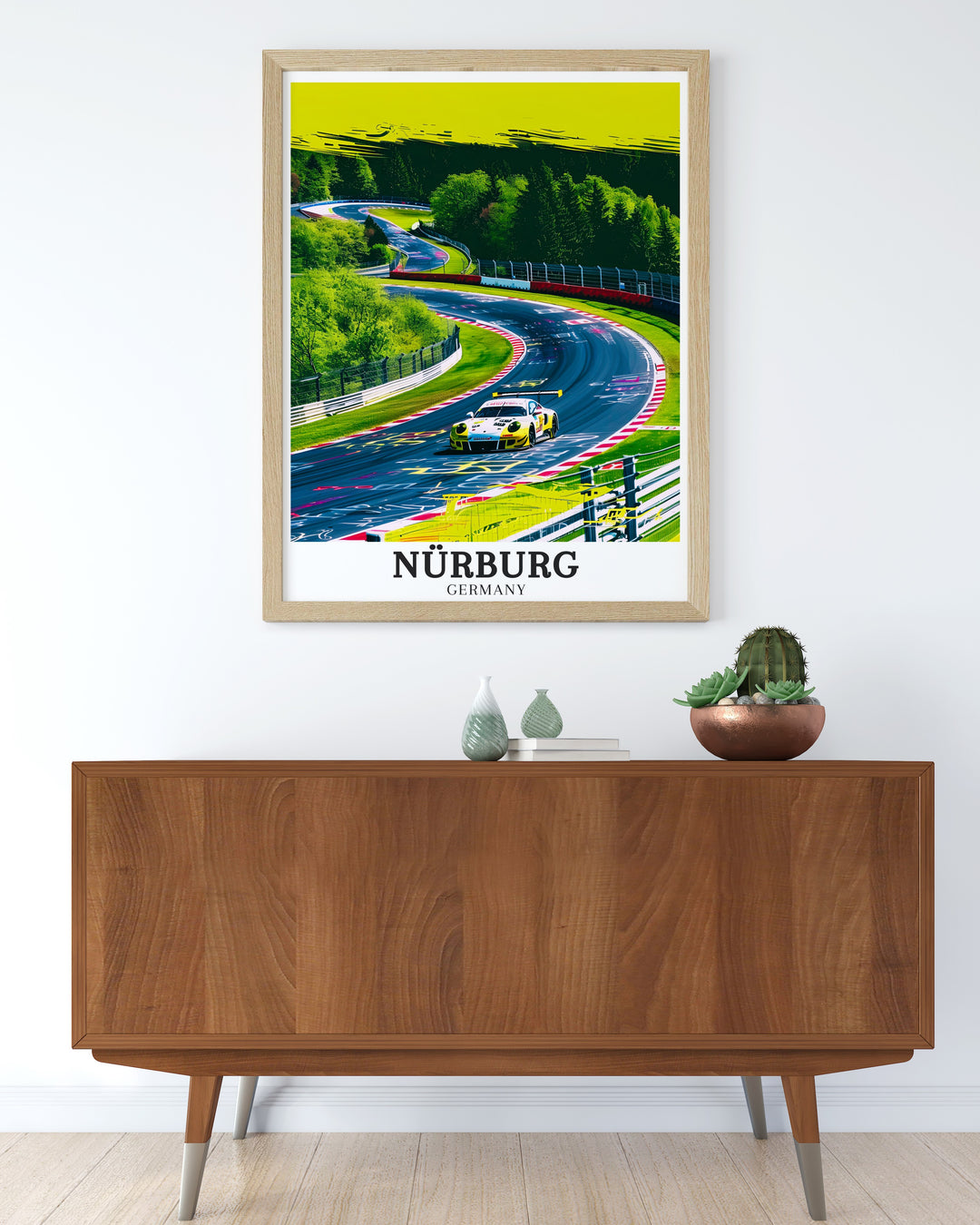 This framed print showcases the iconic Nürburgring circuit, winding through the lush landscapes of Nürburg and Ahrweiler. Perfect for motorsport fans, it captures the thrilling energy of the track along with Germanys scenic beauty.