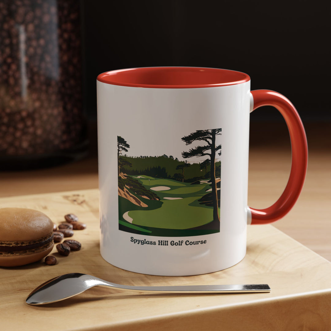 A beautifully crafted Spyglass Hill Golf Course Mug showcasing an intricate design inspired by the iconic golf course. Made of ceramic with a colored rim and handle, this dishwasher-safe mug is perfect for golf enthusiasts and coffee lovers alike.