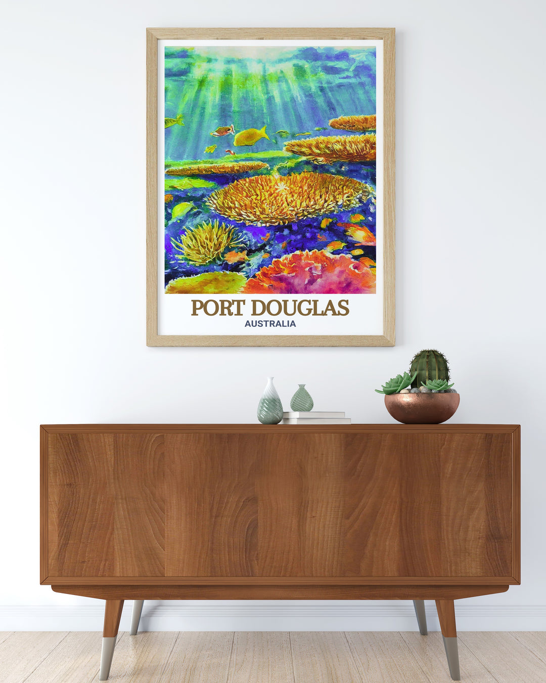 Transform your space with this stunning Port Douglas and Great Barrier Reef art print. The serene blues of the reef and the green coastline make this travel poster a perfect gift for those who appreciate Australias natural wonders.