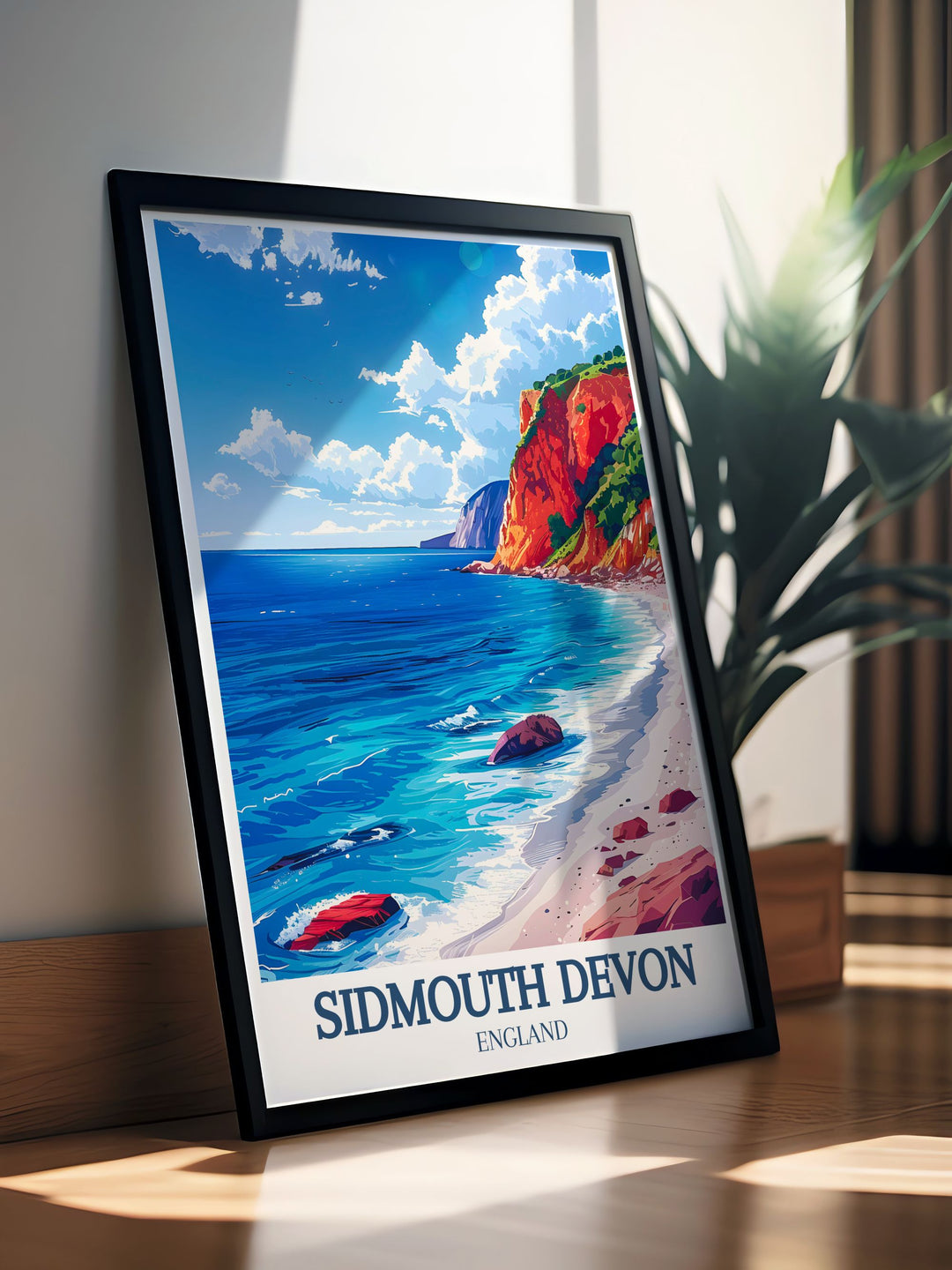 This stunning Sidmouth travel poster captures the beauty of Devons Jurassic Cliffs and Sidmouth Beach. Perfect for lovers of the British seaside, this poster print showcases the natural beauty and coastal charm of Sidmouth, making it a beautiful addition to your wall decor.