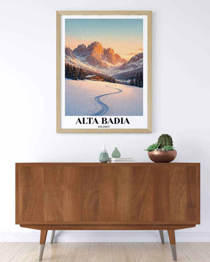 A wooden vertical framed wall art poster of Alta Badia in the Dolomites, featuring a deep S-curve ski track leading to a glowing mountain chalet under a golden sunset.