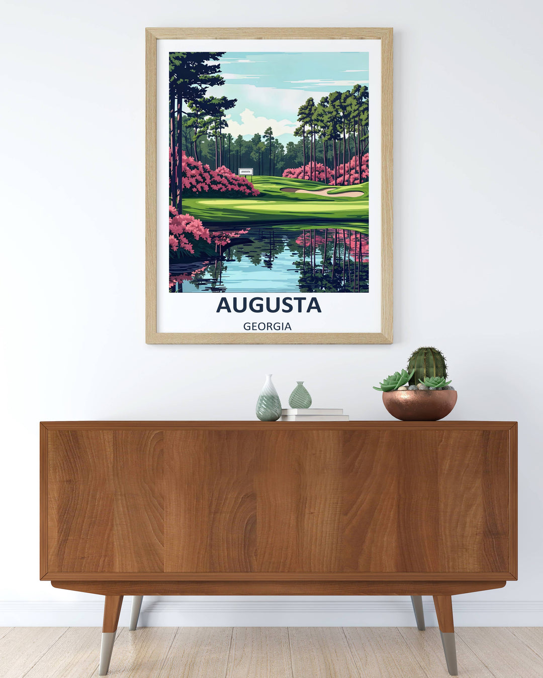 Neo-vintage travel illustration of Amen Corner, showcasing pristine emerald fairways, a calm reflective creek, and detailed pine tree silhouettes using a bold mid-century color blocking style.