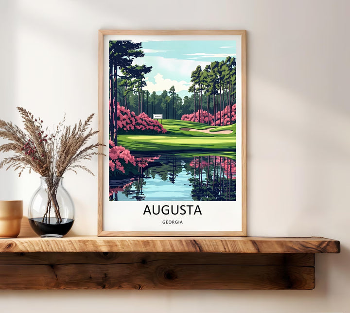 Elegant office wall decor poster displaying a stylized vector graphic of Augusta National links, featuring a calm blue reflection pool, vibrant pink flower beds, and bold modern typography text.