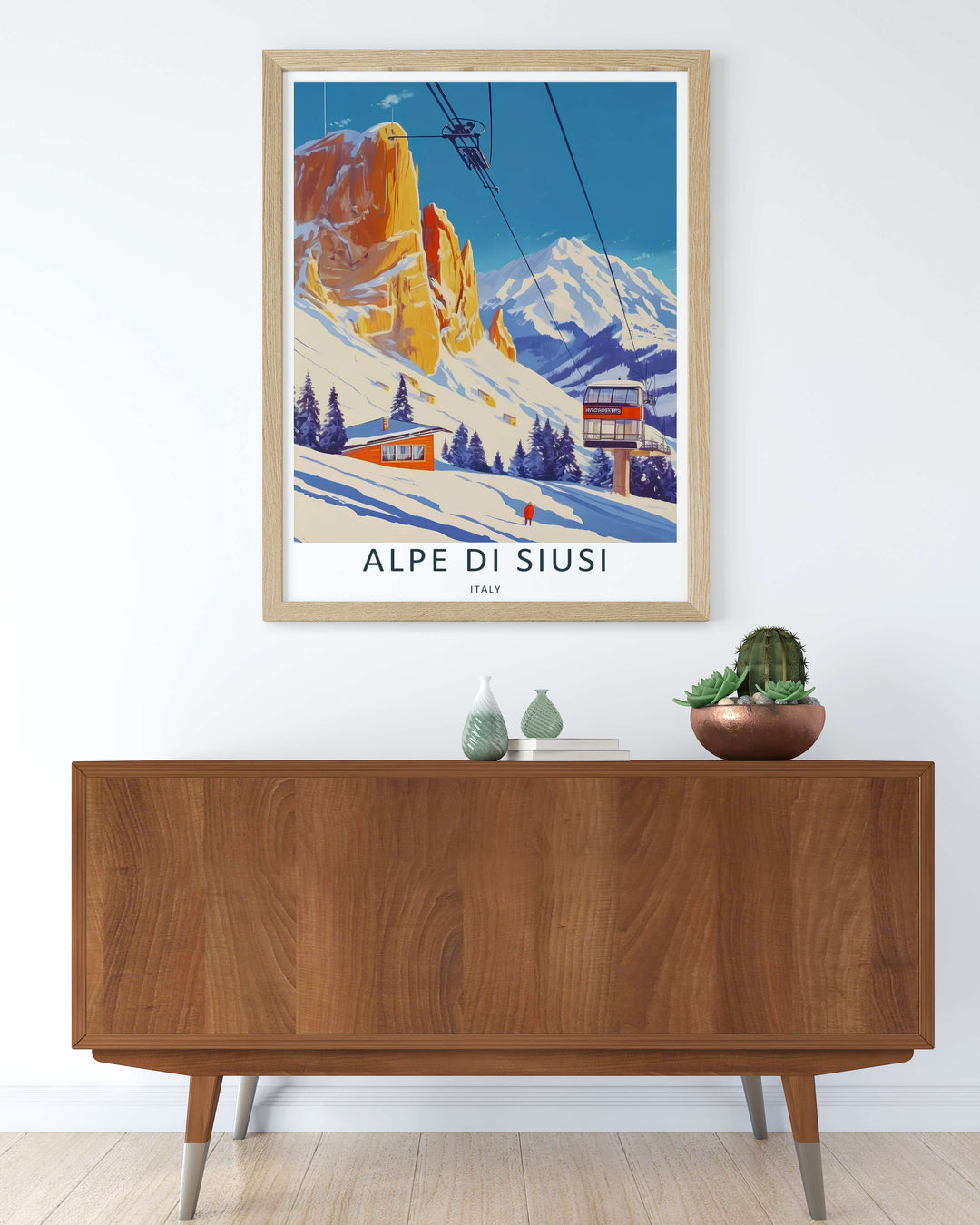 Dolomites ski resort wall art showing crisp blue shadows on Alpe di Siusi snow dunes beneath a towering, warm-toned mountain face. Upgrade your living space with this travel poster in custom framed or wrapped canvas.