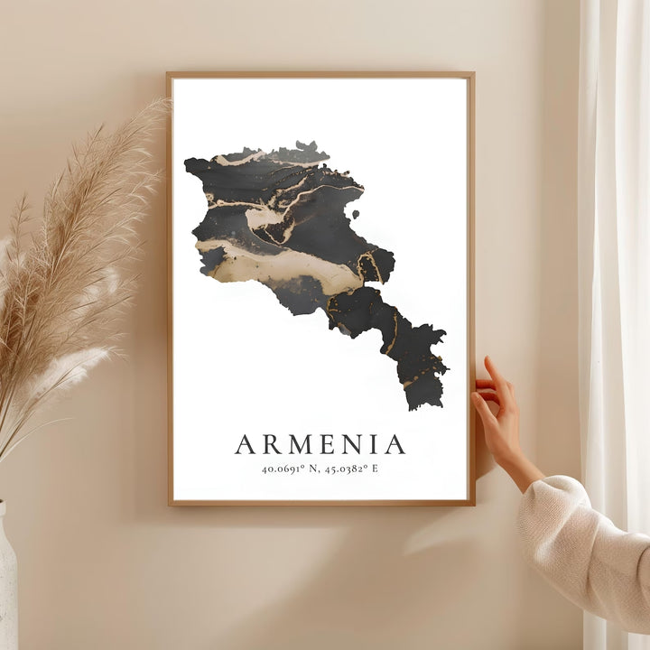An elegant minimalist style travel poster featuring the silhouette of an Armenia map over a clean white background with coordinates, perfect as an unframed print for customized home decor.