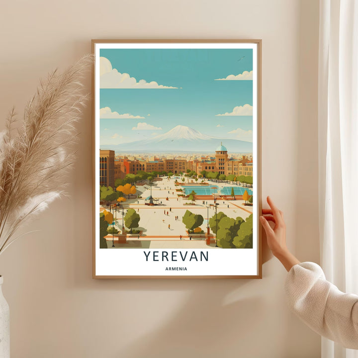 An evocative architectural landscape print of Republic Square in Yerevan featuring soft pink tones and deep green trees, available as a canvas print or a premium bronze framed display.