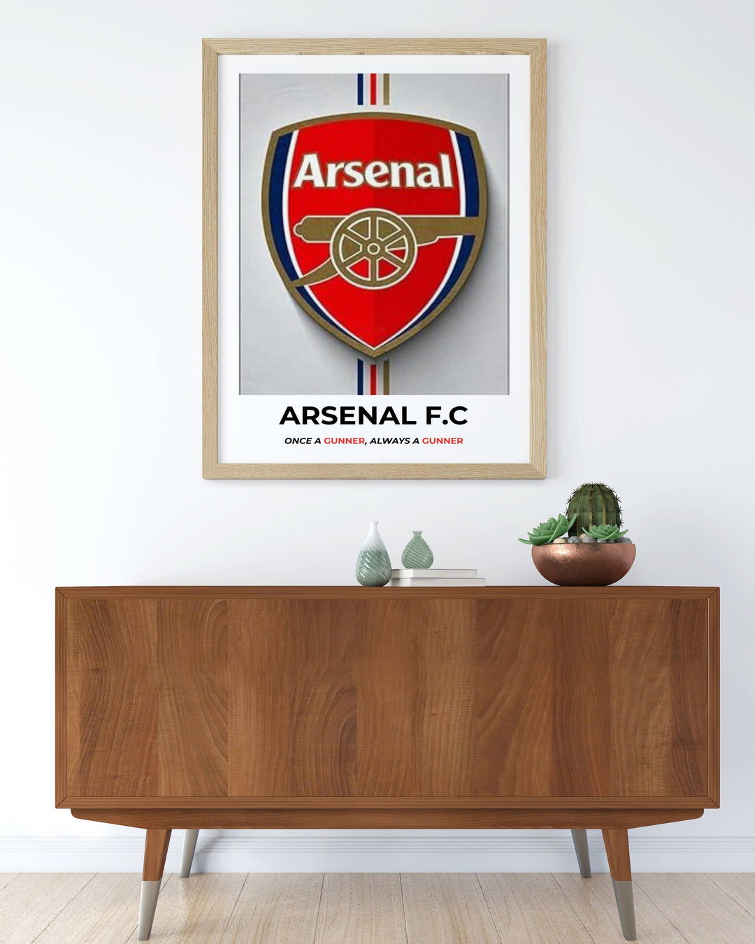 Elegant sports home decor featuring the Arsenal football club badge poster in a black wooden frame. Ideal birthday or holiday gift for passionate Gooners and English Premier League soccer fans.