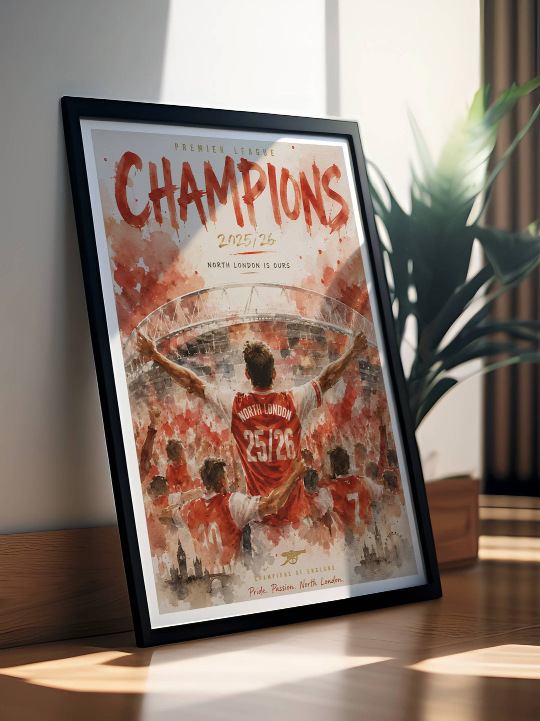 Print celebrating Arsenal FC as Premier League Champions 2025/26, showing fans and players united before the Emirates Stadium with "North London Is Ours" typography, available unframed, canvas, or framed.
