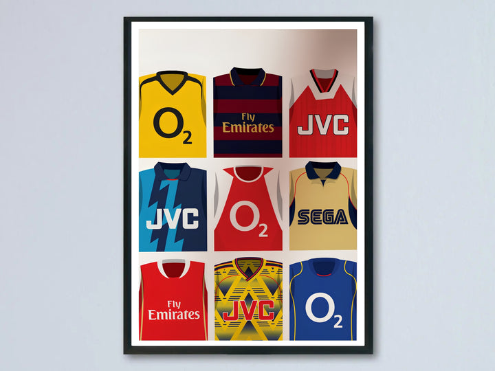 Nine-panel poster of classic Arsenal FC jerseys through the decades, featuring O2, Fly Emirates, JVC, and Sega sponsor kits worn by the North London club, available as a framed print, unframed print, or canvas.
