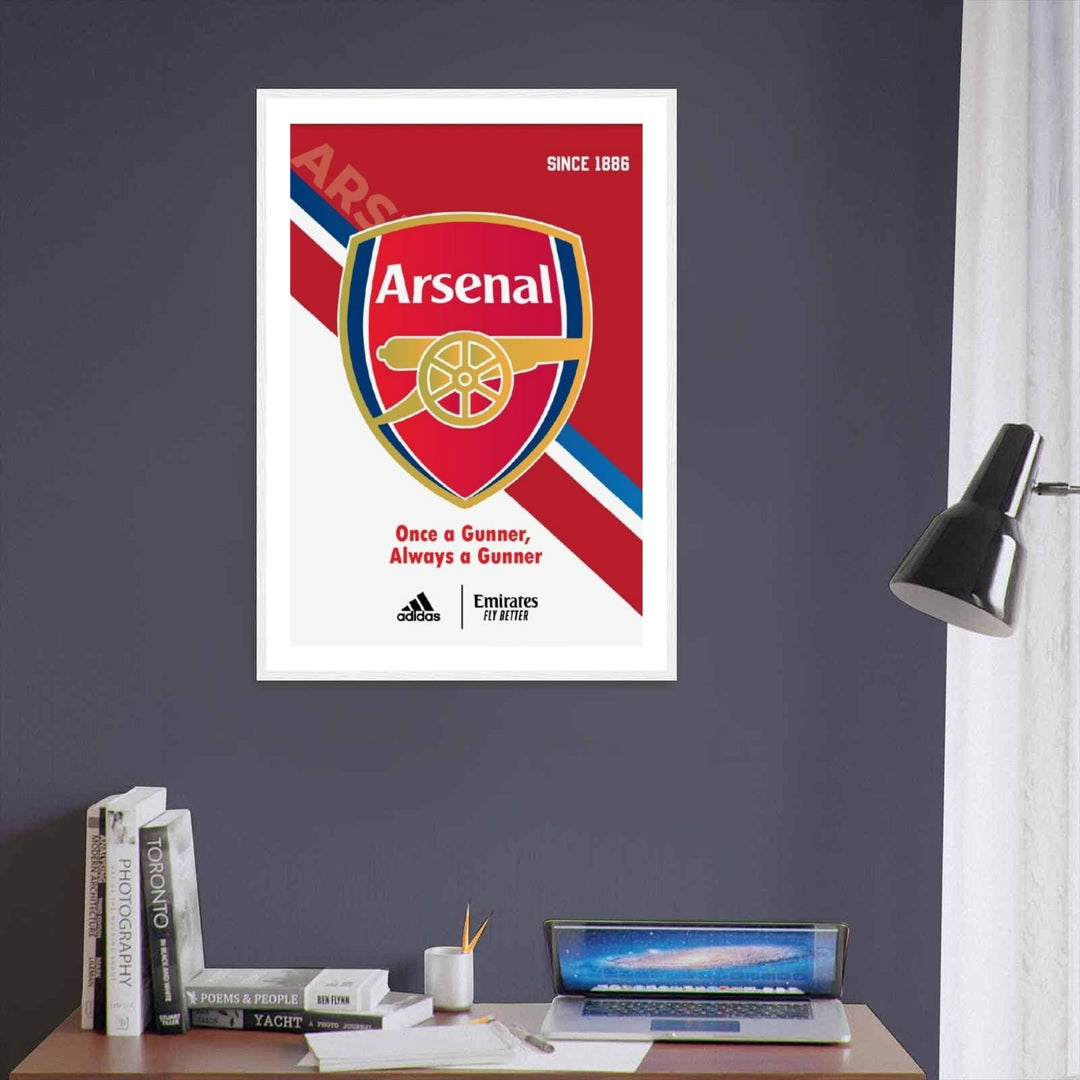 An inviting, colorful focal point for a dedicated sports room or game day feature wall, this vibrant club print of Arsenal FC Since 1886 infuses an athletic, bold energy directly into a modern living room or man cave layout.