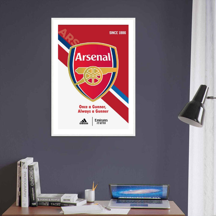 An inviting, colorful focal point for a dedicated sports room or game day feature wall, this vibrant club print of Arsenal FC Since 1886 infuses an athletic, bold energy directly into a modern living room or man cave layout.