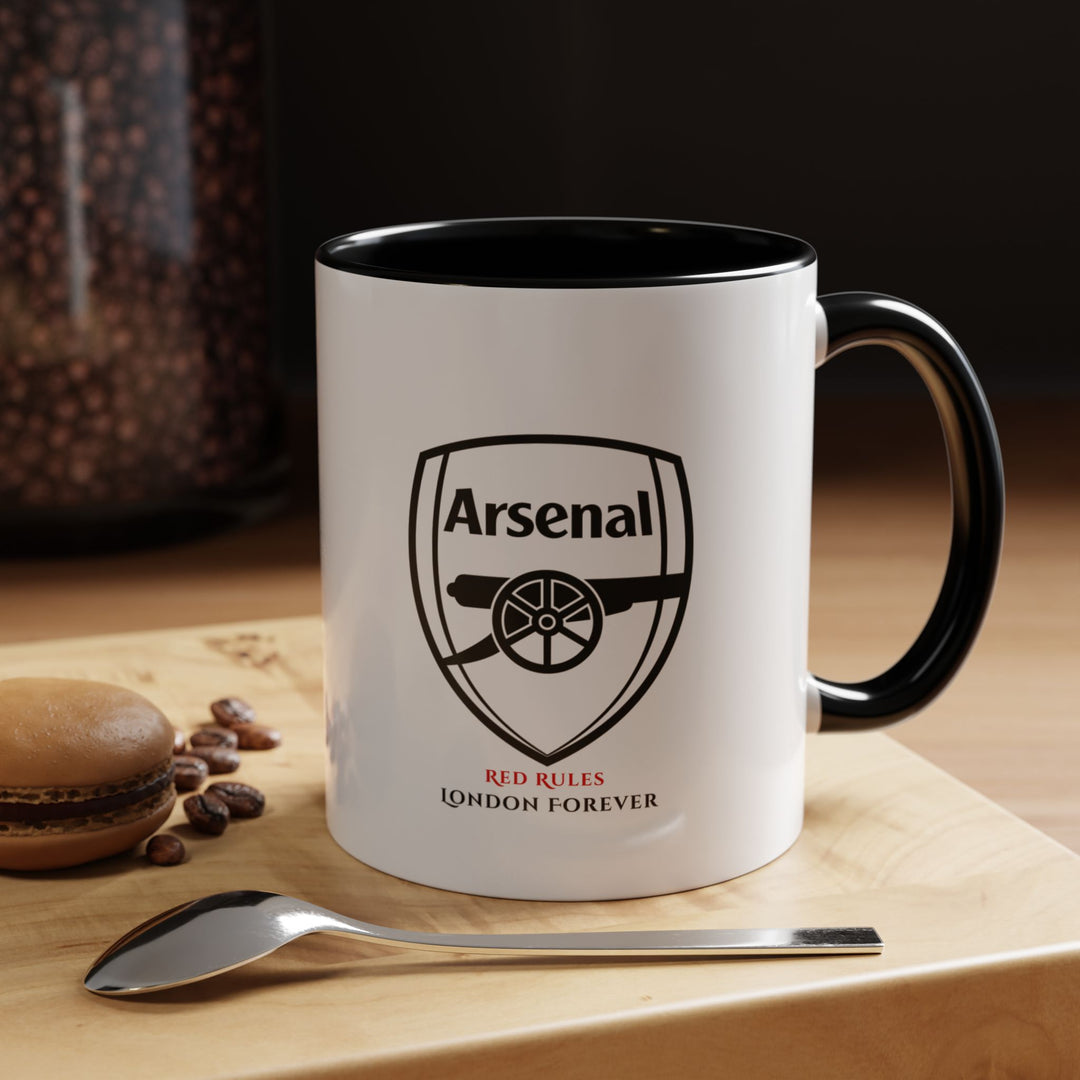 Black Arsenal FC mug with official logo, sleek finish, and durable ceramic design. Perfect tea or coffee cup for supporters who prefer a modern and timeless look. Great for office, home, gifting, or football fan collections. A premium supporter piece from Map Your Dreams.