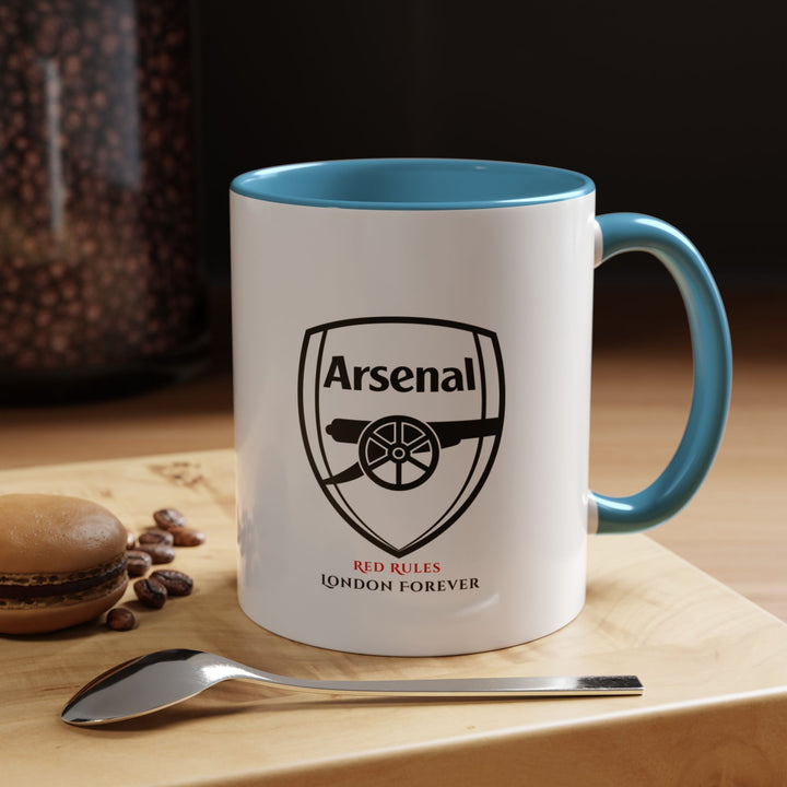 Blue Arsenal FC coffee and tea mug with bold club logo design on high-quality ceramic. Perfect for dedicated football supporters. Great for daily drinking, gifting, or decorating fan spaces. Comfortable grip and modern colour tone. A meaningful supporter accessory from Map Your Dreams for Arsenal fans.