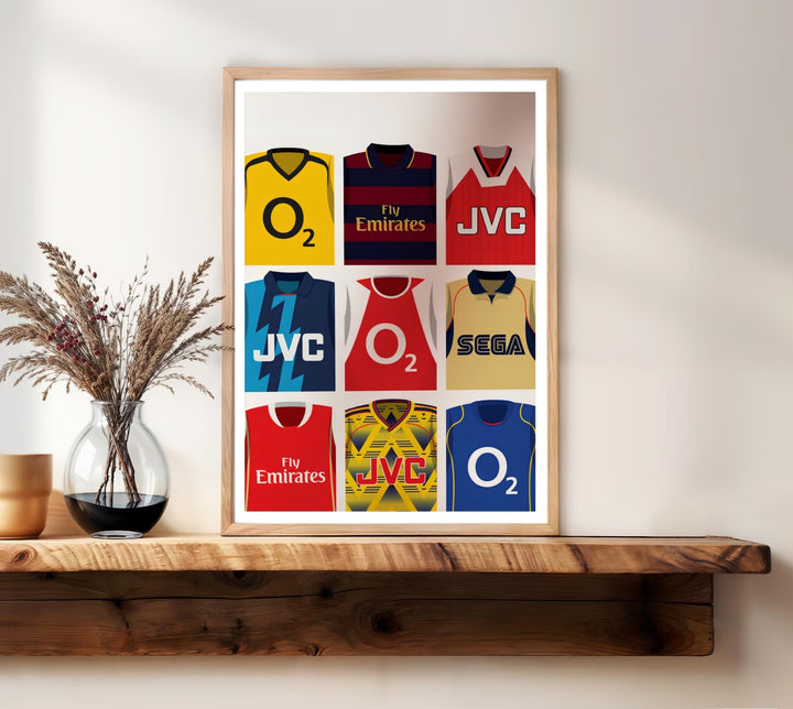 Retro Arsenal FC kit grid print showcasing the yellow away shirt, maroon-and-navy hoops, and sky-blue "bruised banana" jersey worn by the North London side over the years, offered as unframed, framed, or canvas wall art.