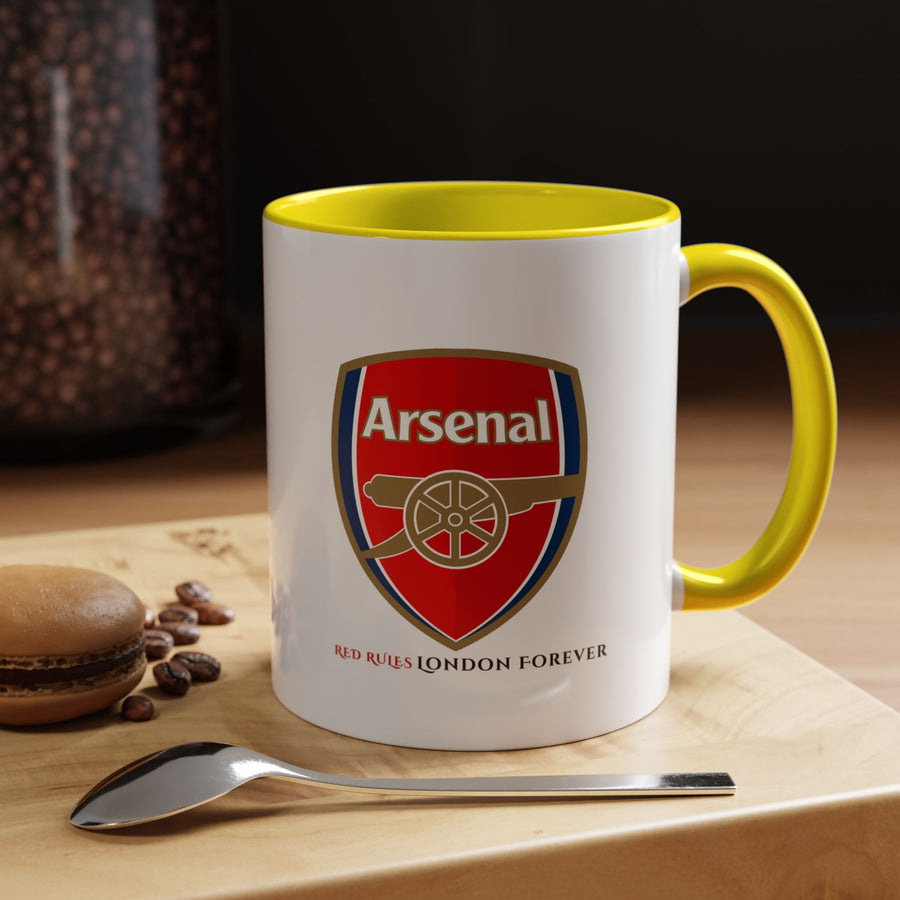 Yellow Arsenal mug with club logo and stadium artwork, ideal for passionate football supporters. Durable ceramic drinkware designed for everyday use and fan collections. Great gift for Arsenal lovers celebrating their team with bright, bold colour. Created by Map Your Dreams.
