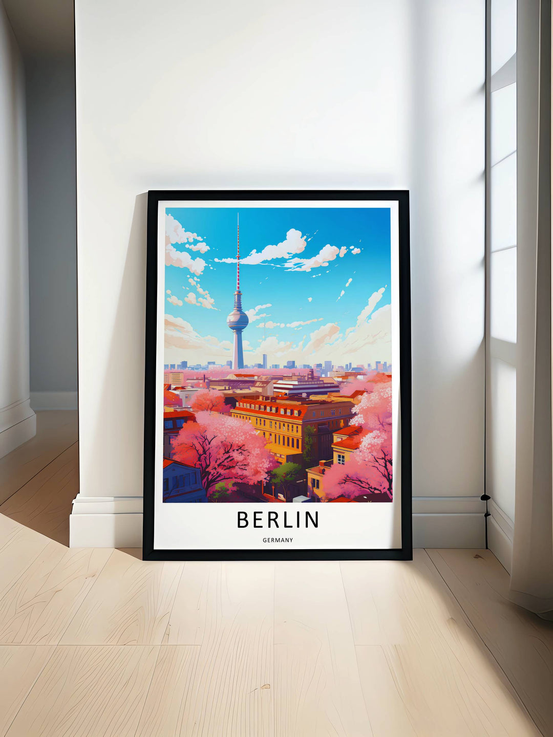 Colorful Berlin cityscape wall art framed elegantly in a modern black border. The bright pink and blue tones add a lively pop of color to minimalist and Scandinavian home decor styles.