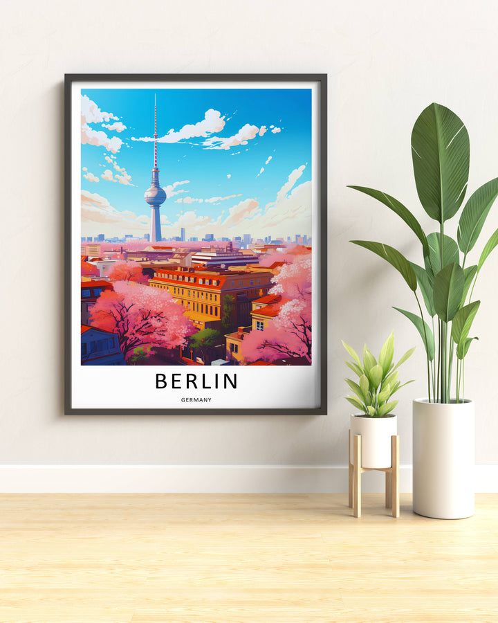A styled lifestyle preview of the Berlin cherry blossom wall art in a black frame, showing how the bold pink tones and sunny sky brighten up a neutral-colored interior living room wall.