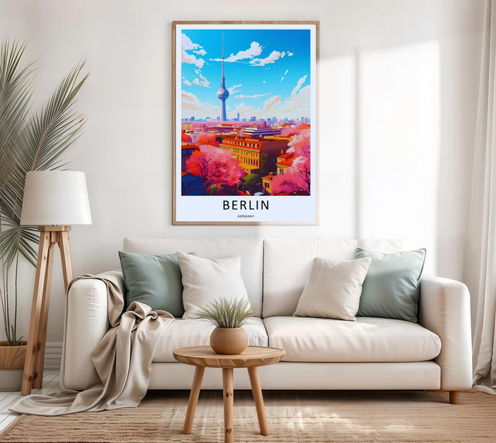 A close-up view of the Berlin skyline poster showing crisp vector lines of historic buildings, lush pink spring trees, and clean bold typography reading Berlin Germany at the bottom.