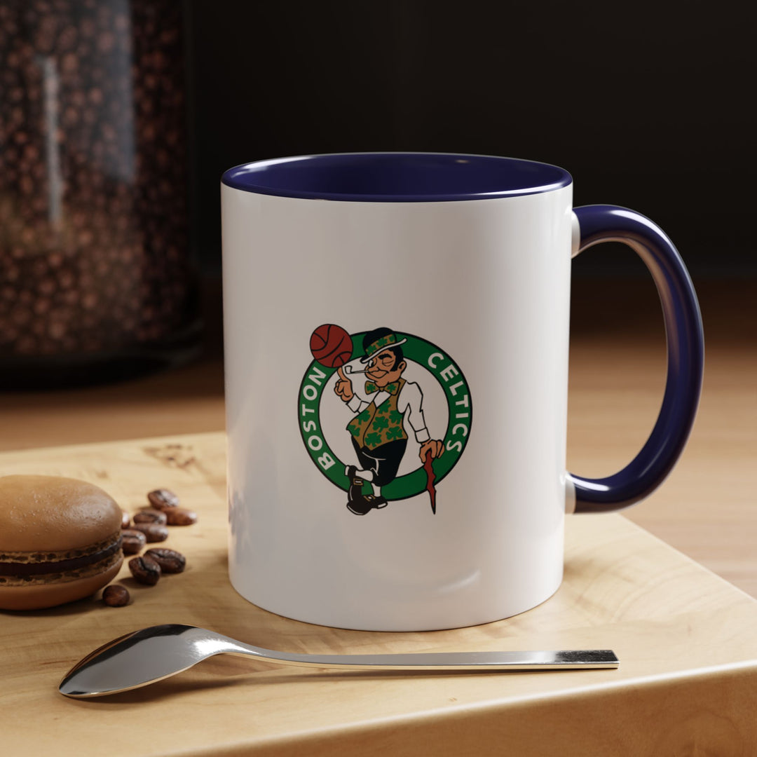 Navy blue Boston Celtics ceramic mug designed for fans who appreciate a refined, classic look. Perfect for coffee, tea, or hot chocolate, it blends durability with elegance, making it a functional piece for daily use, a stylish addition to any fan collection, or a unique gift for dedicated Celtics supporters who love basketball culture.
