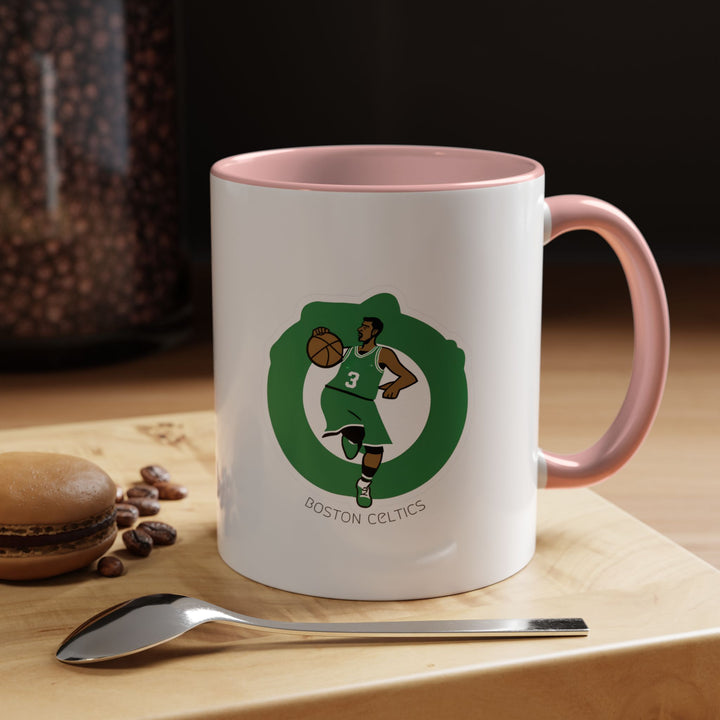 Pink Boston Celtics mug made of ceramic, perfect for enjoying hot beverages or displaying as part of a basketball fan collection. Designed for Celtics supporters seeking a playful and fun way to show team pride.