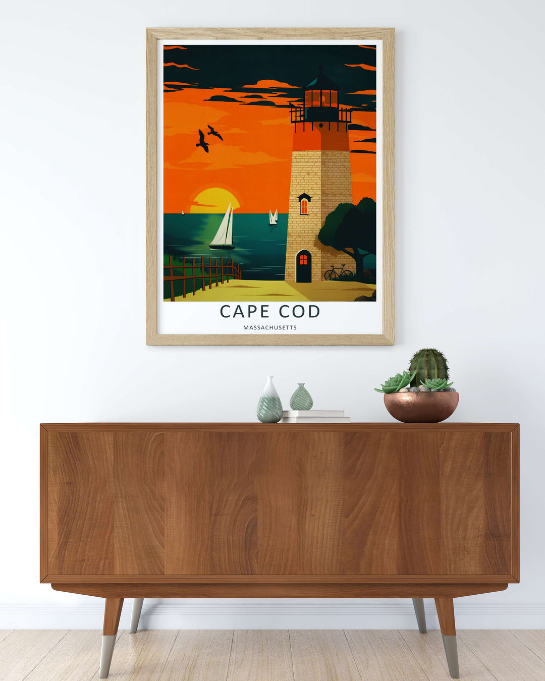 Cape Cod graphic art print showcasing a classic bicycle, coastal trees, and the rich maritime lifestyle of New England. This decorative sunset poster is perfectly suited for modern homes as a framed canvas print or simple paper poster.