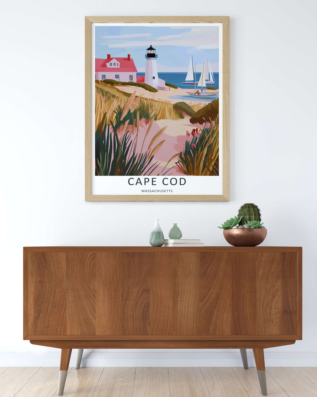 Elegant white lighthouse tower looking out over a calm light blue ocean inlet filled with classic white sailboats in Massachusetts. Upgrade your bedroom wall decor with this MapYourDreams design, available as a framed print.
