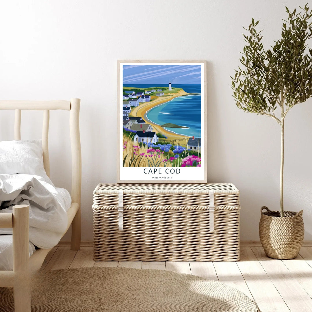 Distant white lighthouse tower standing on a grassy green peninsula overlooking a curved ocean shoreline on Cape Cod. A striking poster design perfect for living room decor as a canvas print, framed art, or poster.