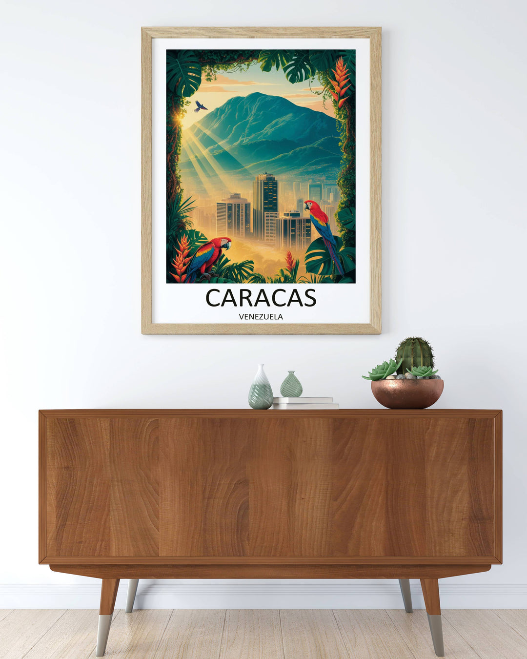 Vibrant vector art print of Caracas, Venezuela, highlighting two highly detailed red, blue, and yellow macaws perched on exotic jungle foliage in the foreground under a warm, glowing afternoon sky.