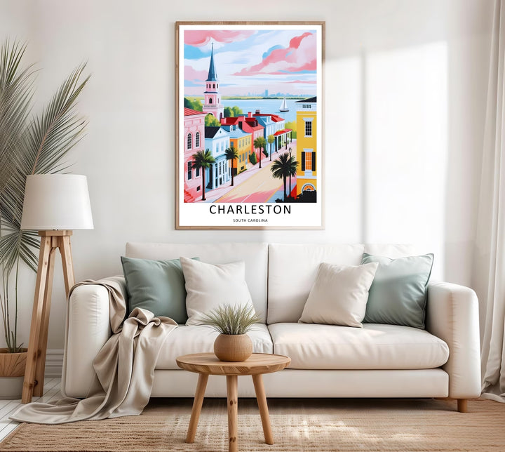 Colorful pastel row houses and a tall church tower resting under a glowing orange and pink twilight sky. A striking poster design perfect for living room decor as a canvas print, framed art, or poster.