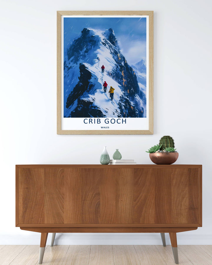 A beautiful mountain theme travel poster featuring the rugged snowy peak and walking trail of Crib Goch, available in flexible unframed, framed, or canvas print layouts. The illustration captures the expansive feeling of a cold high-altitude ridge line.