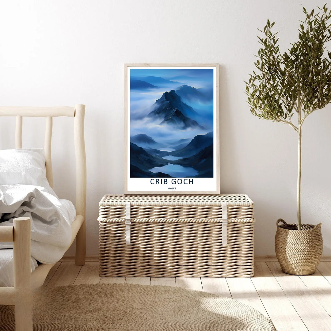 An elegant wilderness print of the dramatic misty Crib Goch mountain ridge, offered as an unframed print, a wrapped canvas, or a framed art finish. The vintage travel poster aesthetic brings a modern graphic touch to classic adventure wall decor.