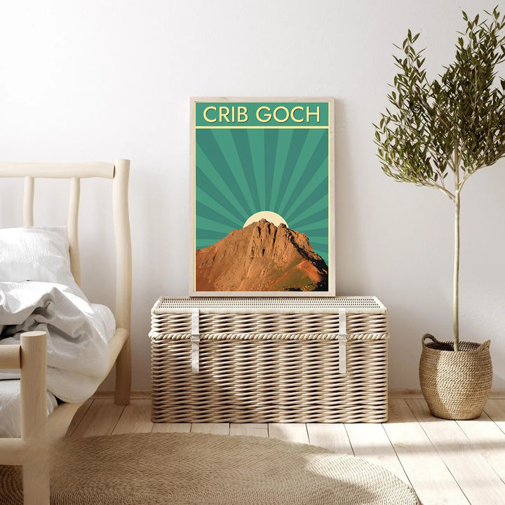 High-contrast artwork of the Crib Goch mountain peak in Snowdonia, Wales, custom made as a canvas, a standalone unframed print, or a multi-colored framed poster. Designed as a vintage travel poster, the print features clean geometric lines, warm mountain tones, and bold retro typography across the header.