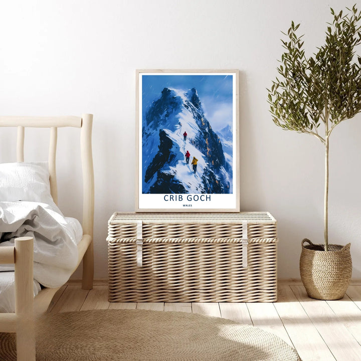 Modern travel poster art featuring a retro winter layout of the classic Crib Goch mountain range, which can be ordered as a stretched canvas, an unframed poster, or a framed print. The landscape art details mountaineers on a sharp knife-edge arête.