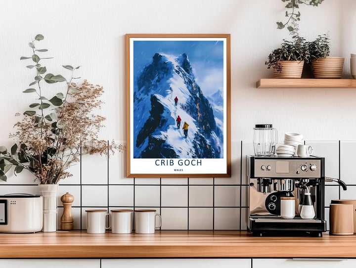 An elegant wilderness print of the dramatic snowy Crib Goch mountain ridge, offered as an unframed print, a wrapped canvas, or a framed art finish. The vintage travel poster aesthetic brings a modern graphic touch to classic adventure wall decor.