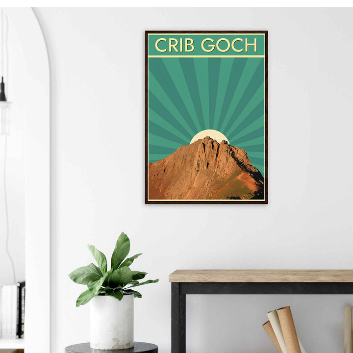 Minimalist travel poster print of Crib Goch, Snowdonia, Wales without text, open for customization as a canvas piece, an unframed art print, or a framed wall accent. The mountain wall art highlights the natural texture of the peak juxtaposed against a bold, radiant teal-and-green geometric sunburst.
