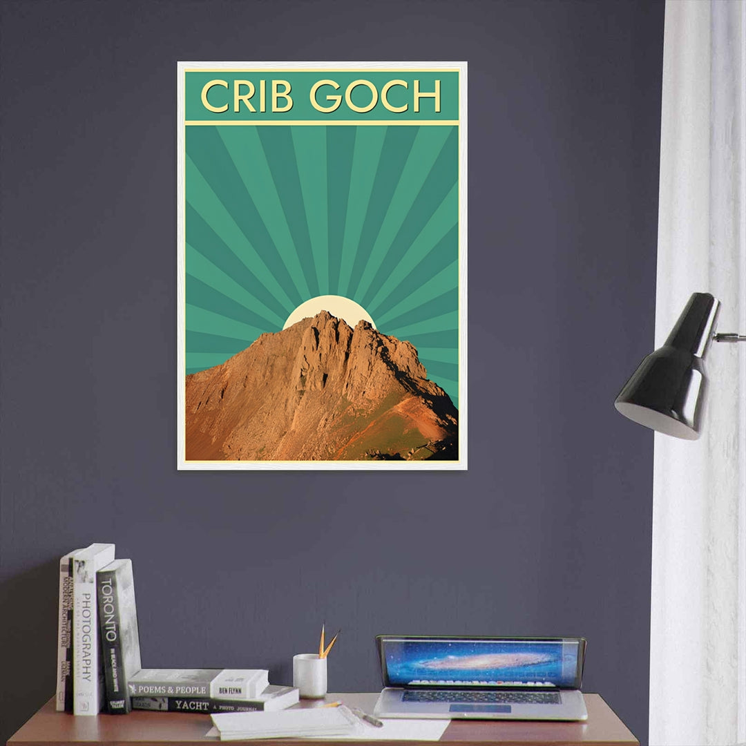 A striking travel print of the iconic Crib Goch ridge in Snowdonia National Park, Wales, ready to order as an unframed print, a stretched canvas, or professionally framed wall decor. This mountain artwork acts as eye-catching wall decor, perfectly blending a realistic mountain ridge with bold art deco inspired fonts.
