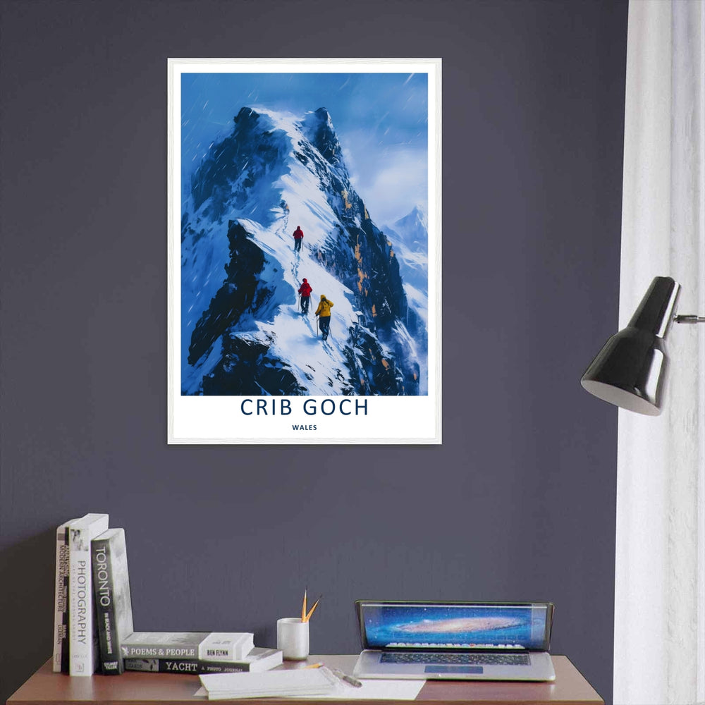 A vintage style landscape art print displaying the beautiful snow-covered Crib Goch mountain ridge view, offered as a canvas, an unframed poster, or within a framed display. The scene highlights adventurers traversing a sharp icy path.