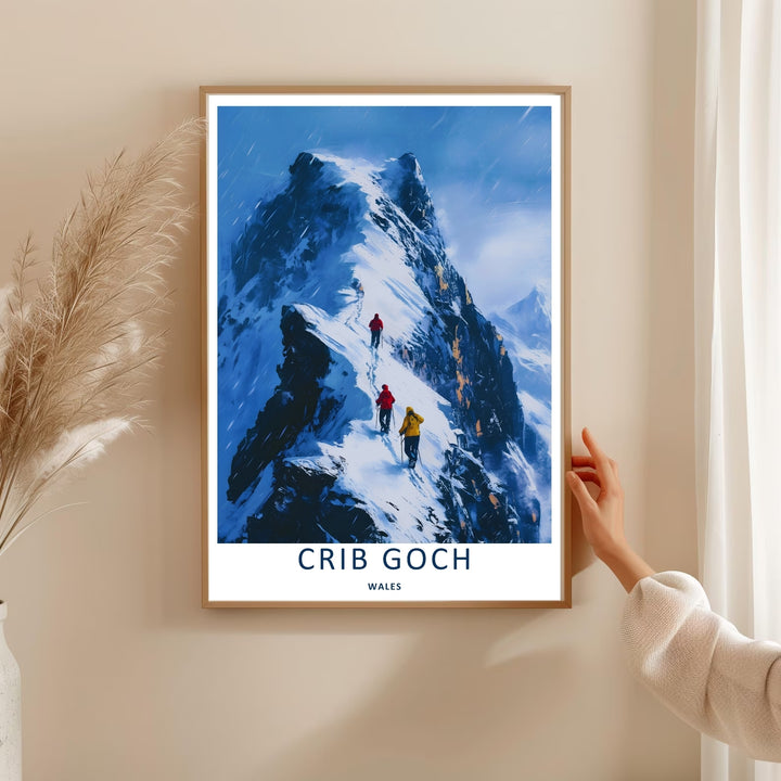 High-quality travel poster artwork showing an alpine Crib Goch mountain hiking path illustration, purchasable as canvas wall art, an unframed print, or a framed art piece. The print captures the dramatic texture of a winter ridge scramble.