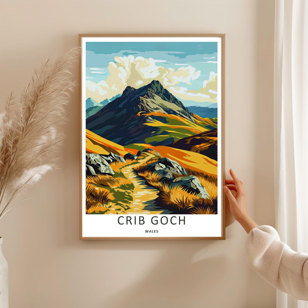 High-quality travel poster artwork showing a stylized Crib Goch mountain hiking path illustration, purchasable as canvas wall art, an unframed print, or a framed art piece. The print captures the dramatic texture of a winding trail cut through steep mountain slopes.