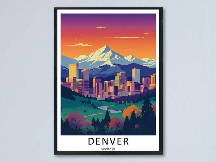 A Denver twilight art print showing a winding valley road leading toward a glowing city skyline at sunset. This Colorado mountain wall decor is sold as a framed canvas or unframed print by MapYourDreams.