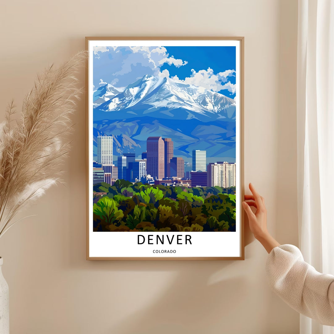 Denver mountain travel artwork illustrating a colossal blue and white snow ridge looming directly over a metropolitan grid. This beautiful landscape wall art by MapYourDreams comes as a gallery canvas or custom framed print.