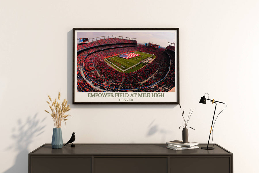 Black-framed stadium tribute poster featuring stadium interior view and “Empower Field at Mile High” text