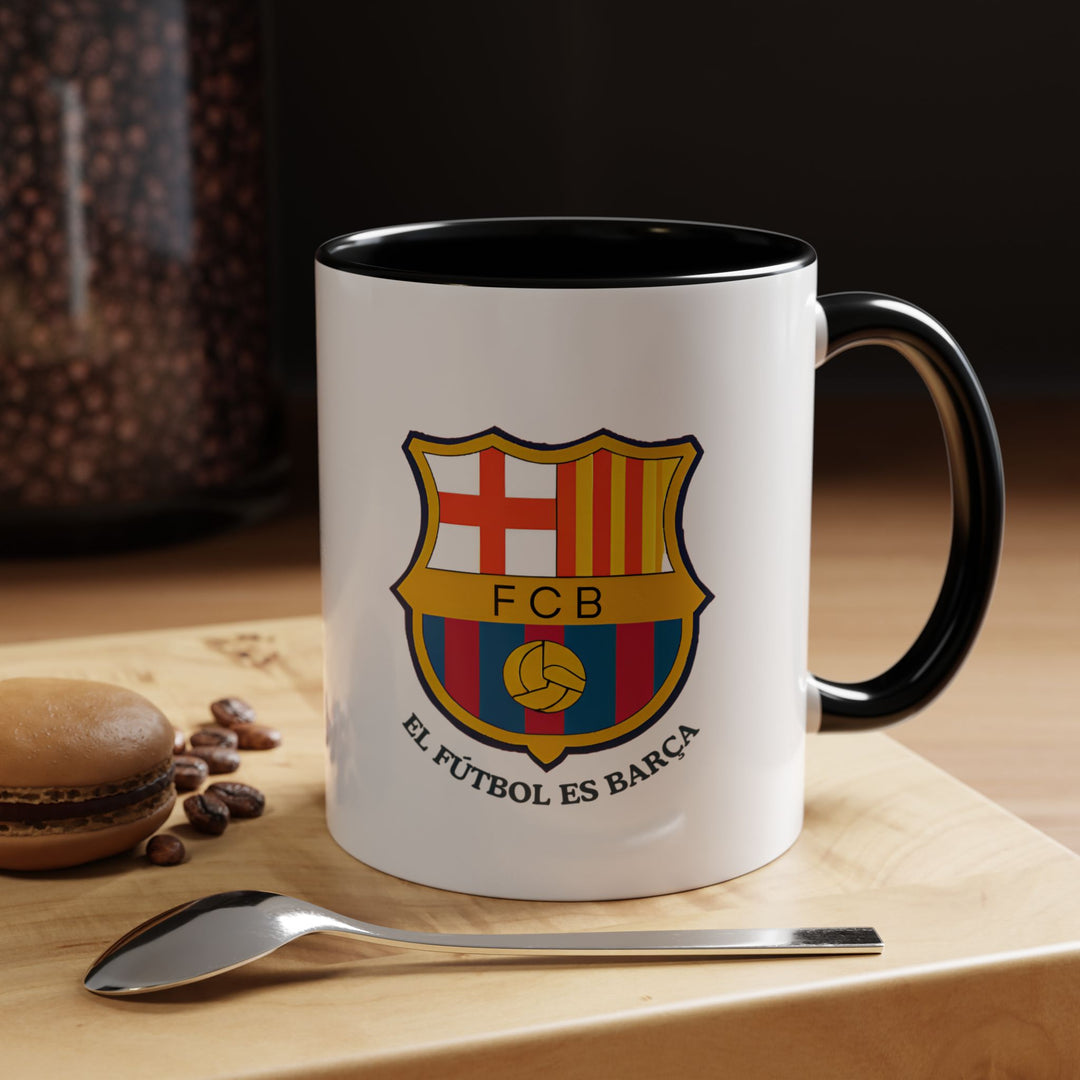 A sleek black FC Barcelona supporter mug displaying the official crest in full color. Stylish and bold, this mug suits fans who appreciate understated but powerful team representation. Perfect for coffee, tea, or hot drinks, and durable enough for everyday use at home or at the office.