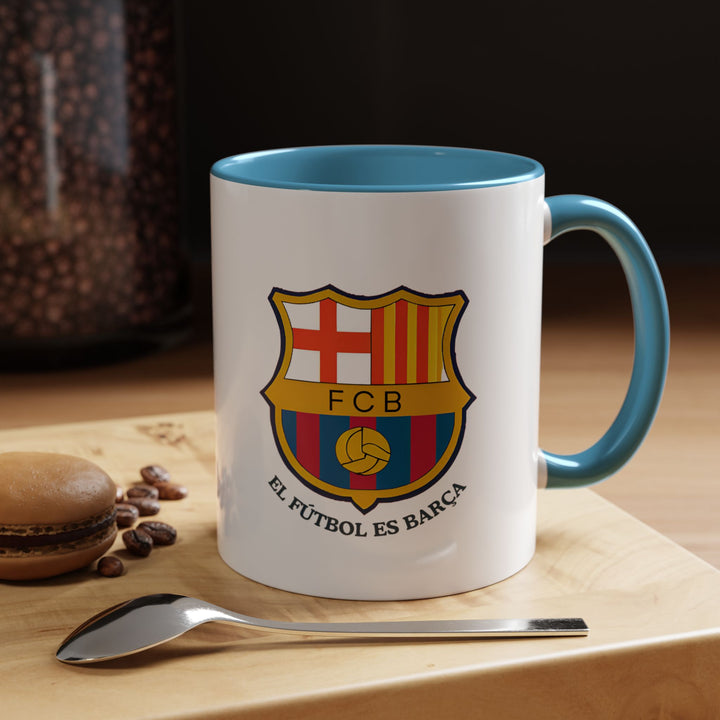 A blue FC Barcelona tea and coffee mug showcasing the historic club crest. Ideal for passionate Blaugrana supporters who want to infuse team pride into every beverage. Strong ceramic construction, comfortable handle, and a smooth drinking experience make this mug a versatile everyday favorite for home or work use.