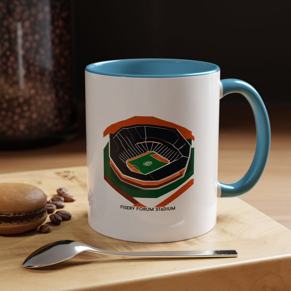 A blue Fiserv Forum stadium mug showing the home arena of the Milwaukee Bucks in careful illustration, designed for fans who enjoy displaying team passion through daily use. Suitable for coffee, tea, or warm drinks, this mug brings memories of game nights, buzzer beaters, and the excitement of supporting The Deer.