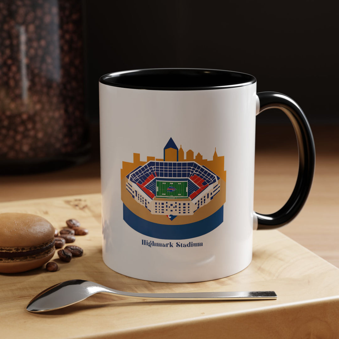 Black Highmark Stadium Coffee & Tea Mug featuring a bold, high-resolution stadium design that stands out vividly against the dark ceramic background. Displayed beside game-day snacks, this mug offers a sleek and modern look that appeals to Buffalo Bills supporters who want stylish drinkware that brings team pride into daily routines and weekend football traditions.